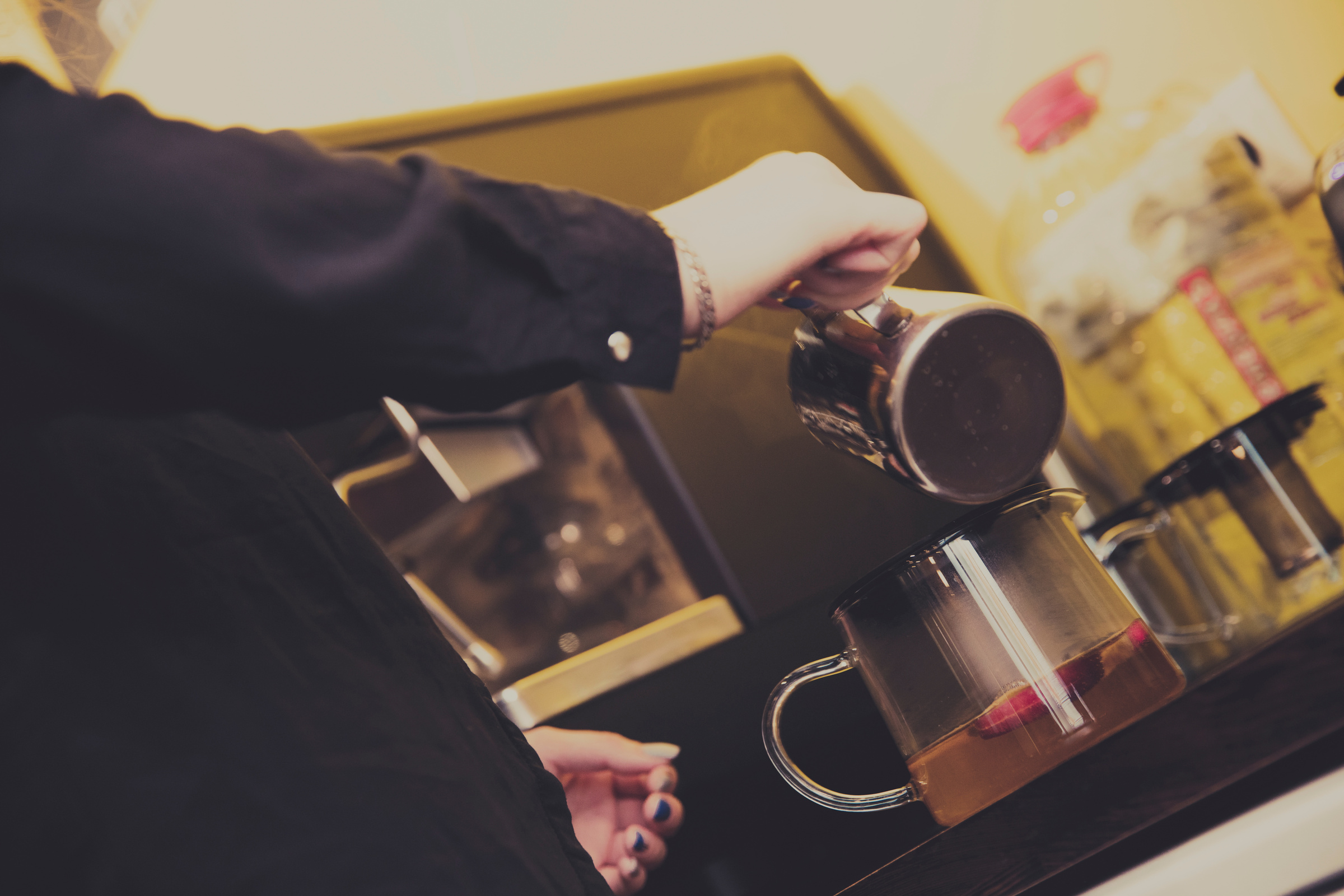 barista is making a tea